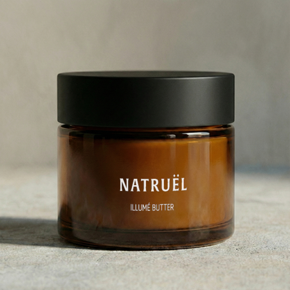 Illumé Butter dense botanical body butter in amber glass jar

